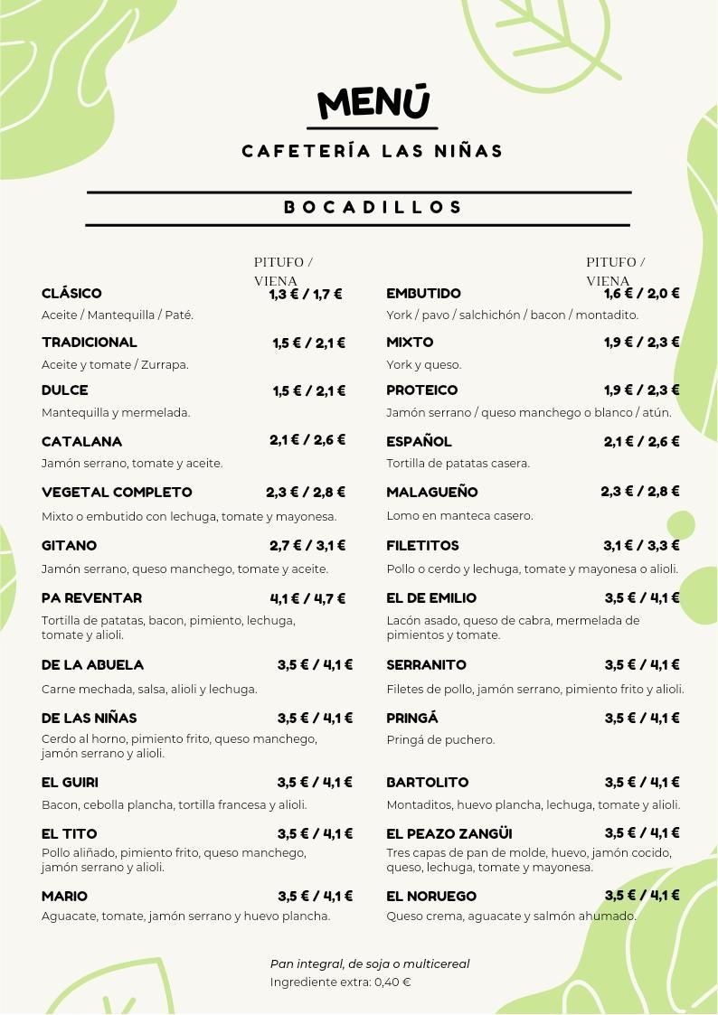 Un menú para una cafetería con hojas verdes.
