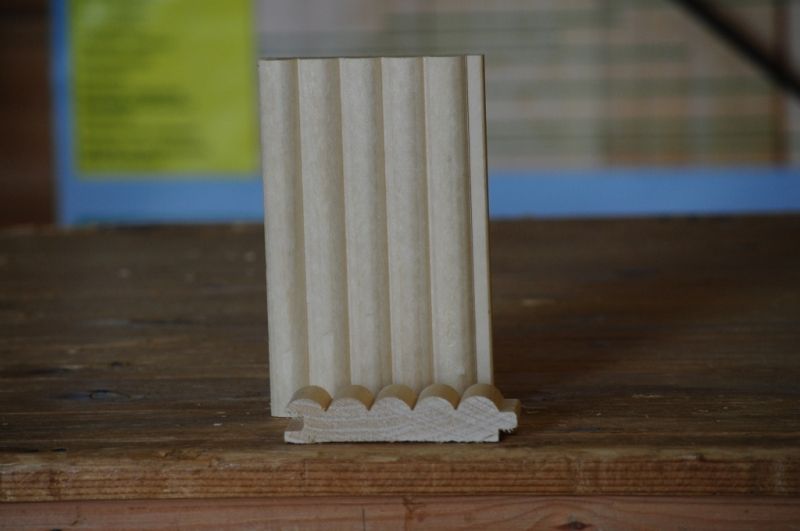 Paneeleilla yksityiskohtia puurakennukseen