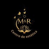 Logotipo dorado para M&R Esthetics Center con una flor de loto, manos, mariposas y texto sobre fondo negro.