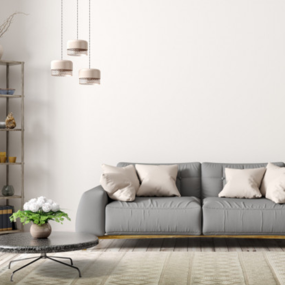 Une pièce vide avec un mur blanc et une porte.