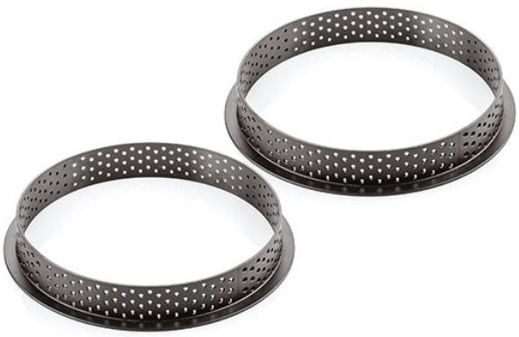 Zwei schwarze Ringe mit Löchern darin auf weißem Hintergrund