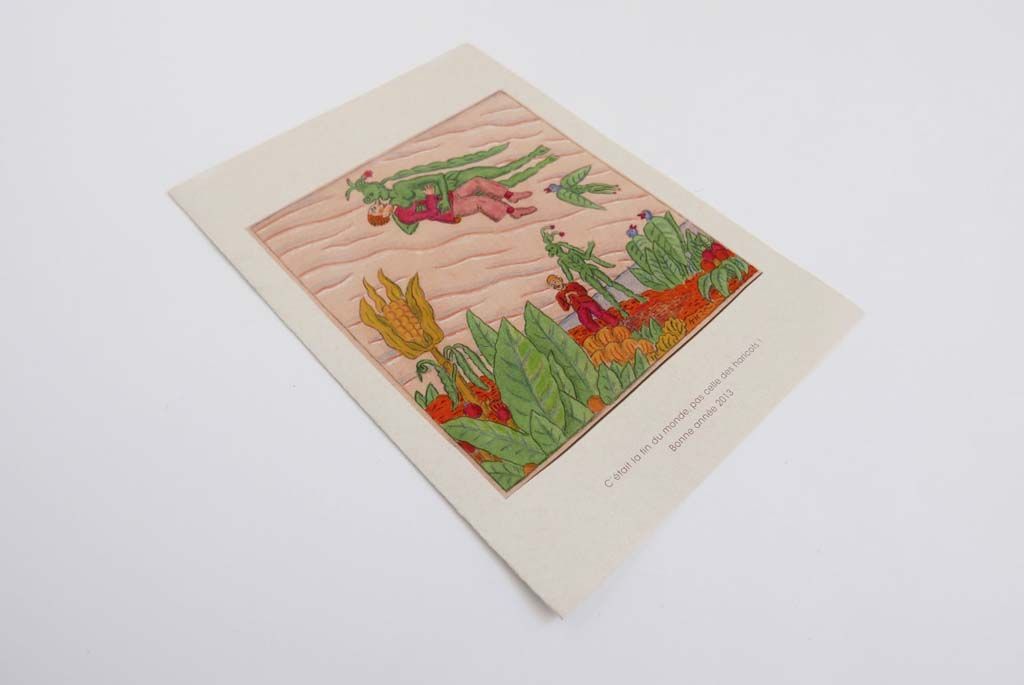 Carte de vœux vue en intégralité posée pour Ligne et couleur, avec motifs verts et roses