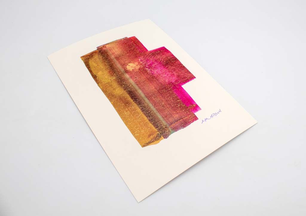 Œuvre abstraite aux tons dorés et roses