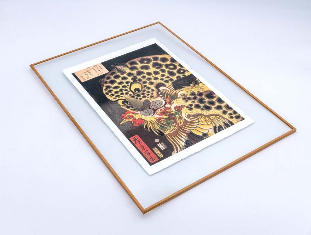 Impression et cadre pour un visuel japonais représentant un félin