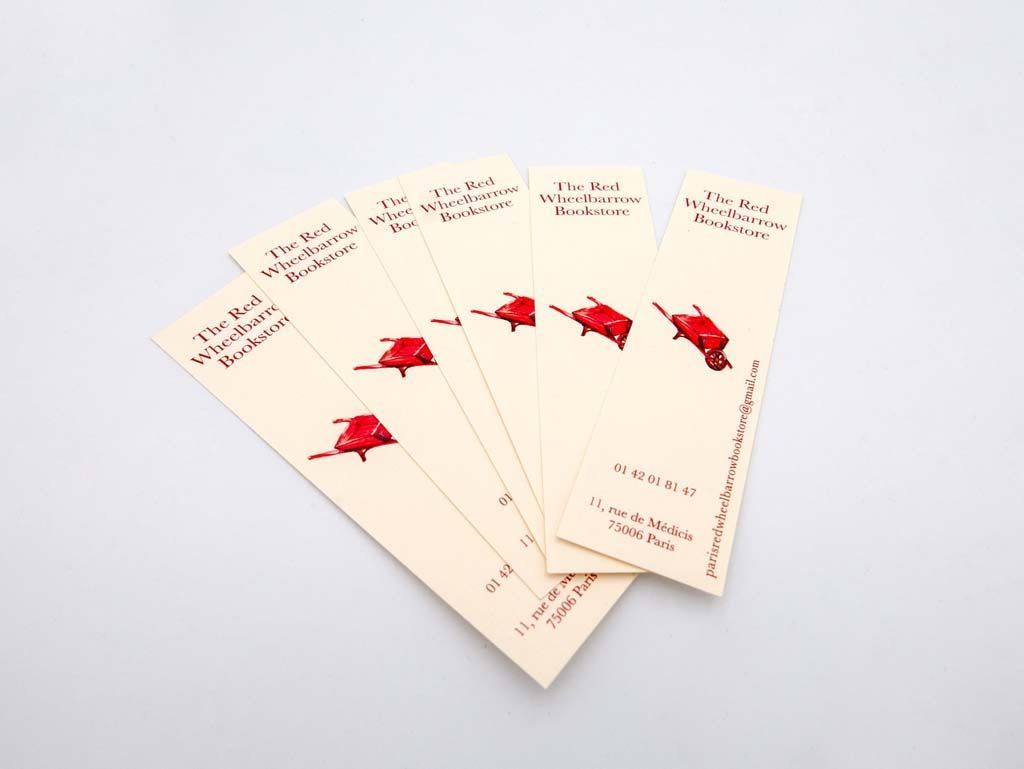 Collection de marques-pages d'une librairie de Paris imprimés en blanc avec motif et ecritures rouges