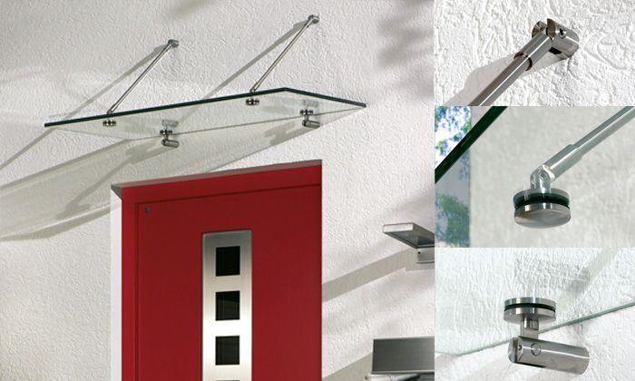 Eine rote Tür mit einem Glasdach darüber