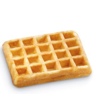 Um waffle com buracos em um fundo branco