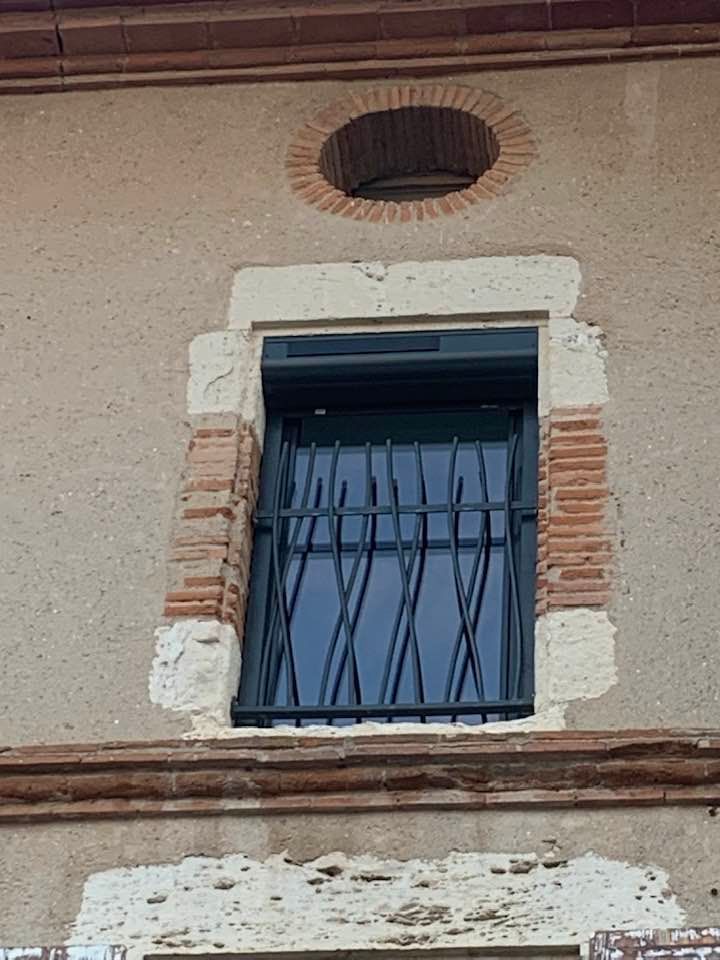 Pose fenêtre avec barreaux