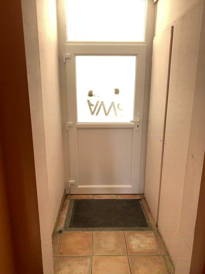 Remplacement d’une porte d'immeuble