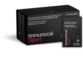 Caja negra y paquete de suplemento Immunocal Sport, texto rojo y blanco, fondo blanco.