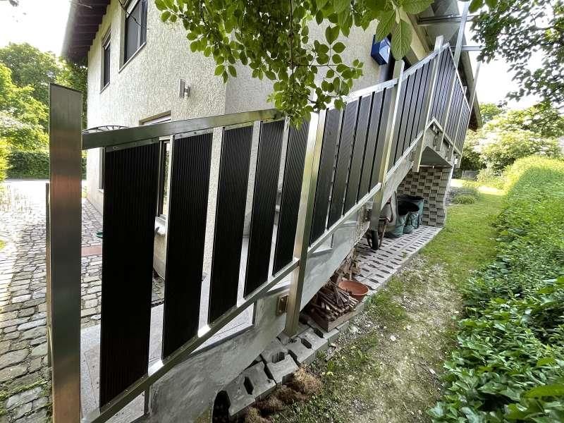 Geländer mit WPC-Trespa Füllung