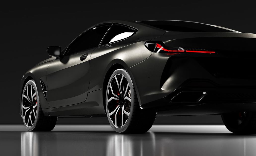 Une voiture noire à la carrosserie mate.