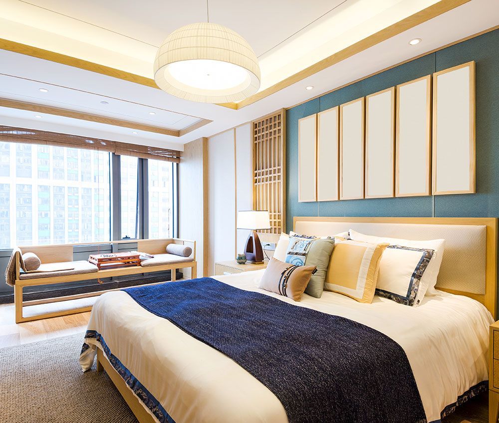 Chambre d'hôtel de luxe bleu et or avec climatisation intégré