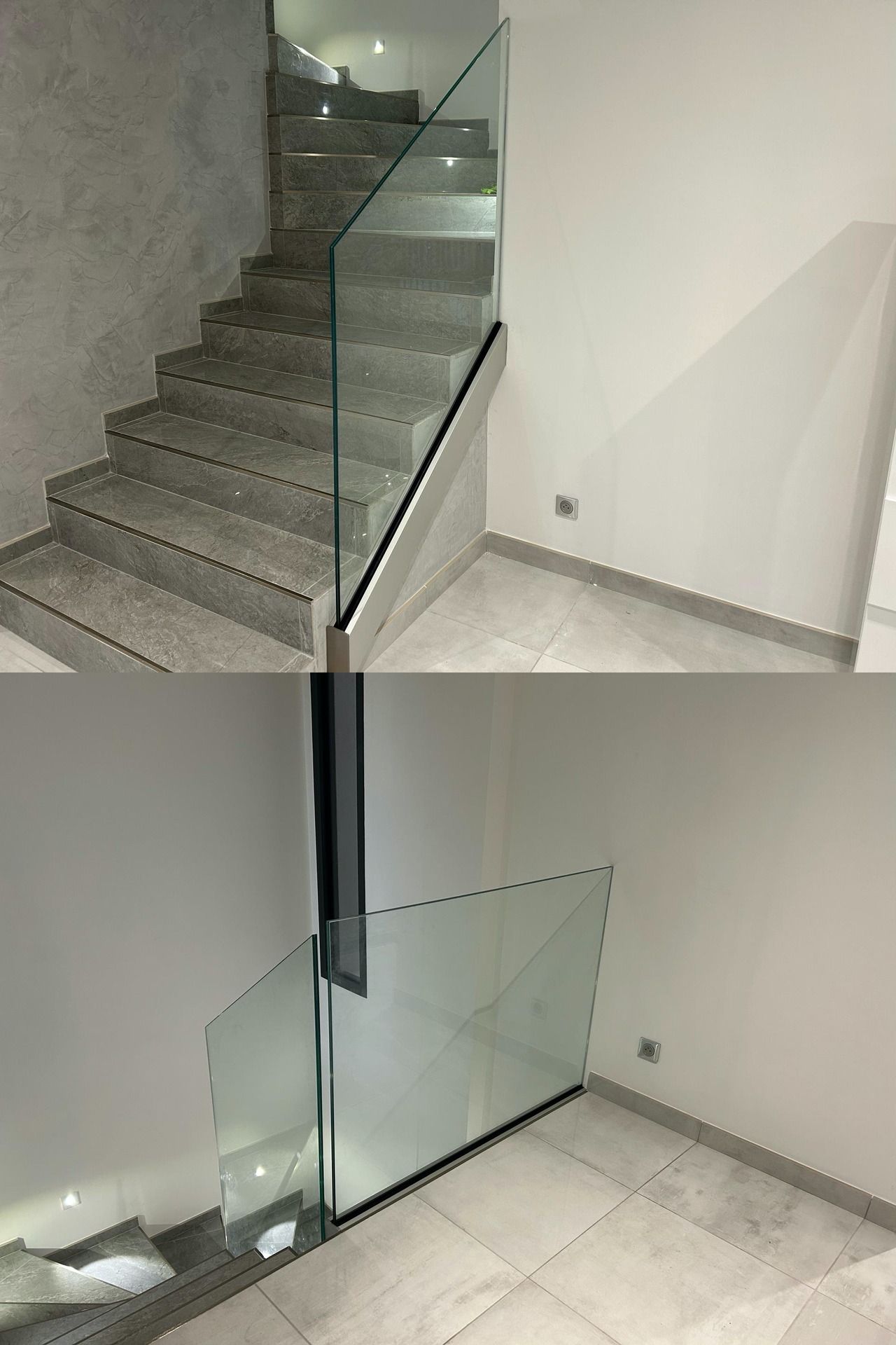 Escalier en pierre avec garde-corps en verre. Vue de dessous : le verre s'étend jusqu'au sol. Murs et sol clairs.