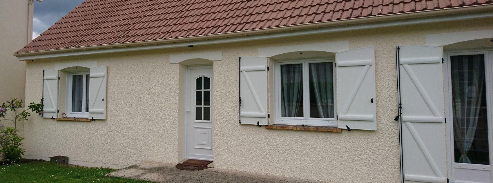 Ravalement de la façade d'un pavillon de plain pieds