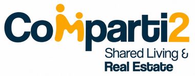 Logotipo de Comparti2 con texto azul y naranja, con las palabras &laquo;Shared Living & Real Estate&raquo;