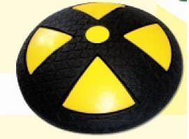 Reductor de velocidad circular de color negro y amarillo con símbolo de peligro.