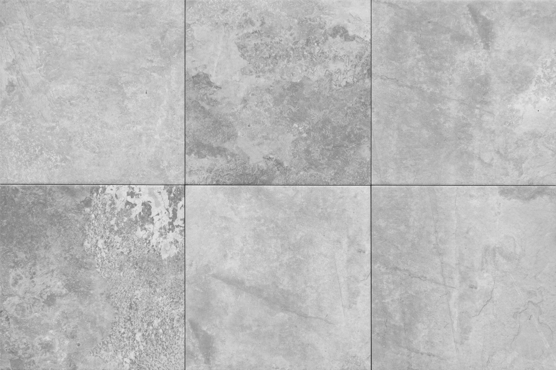 Carreaux gris carrés disposés en grille.