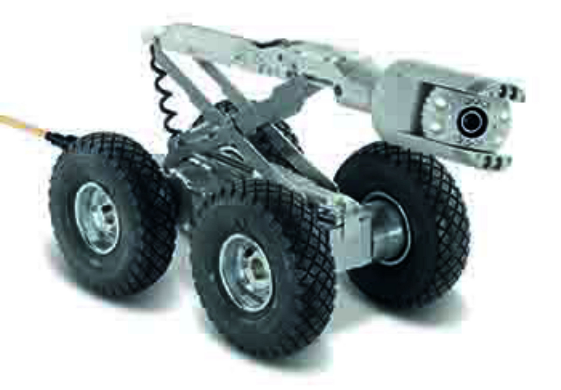 Un robot con una cámara adjunta está sentado sobre una superficie blanca.