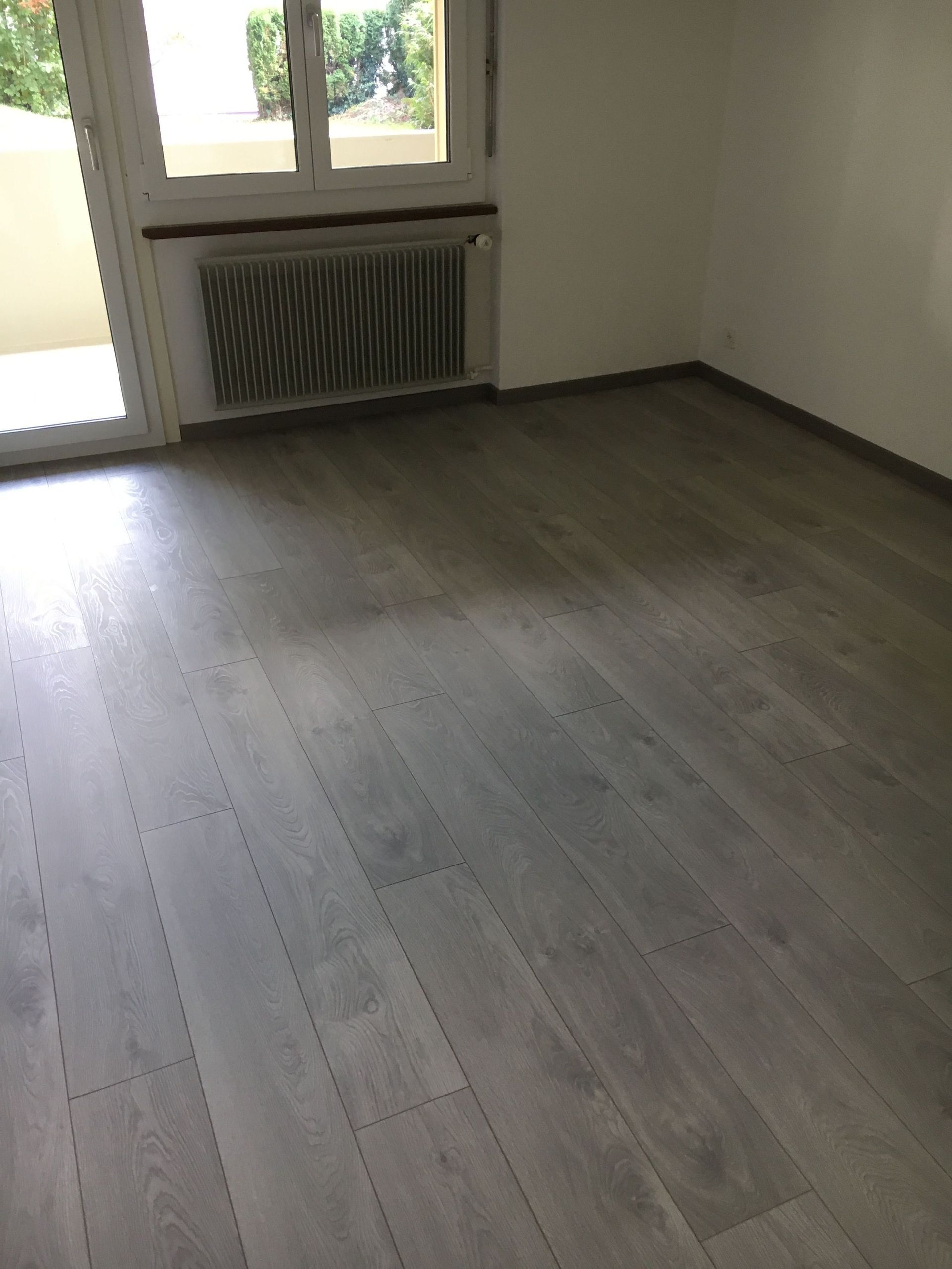 Bodenlegerarbeit nachher - All-in-One Renovationen Hittnau