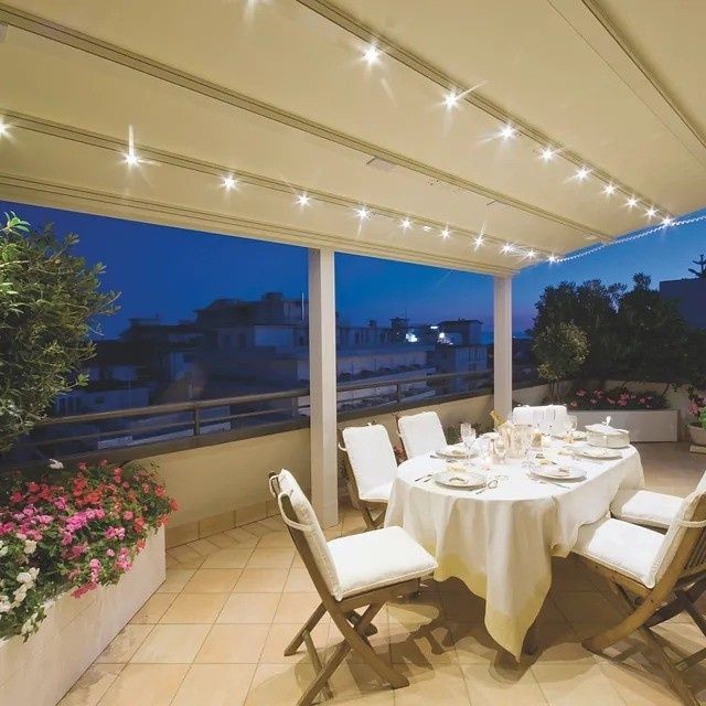 Mesa de comedor cubierta para terraza