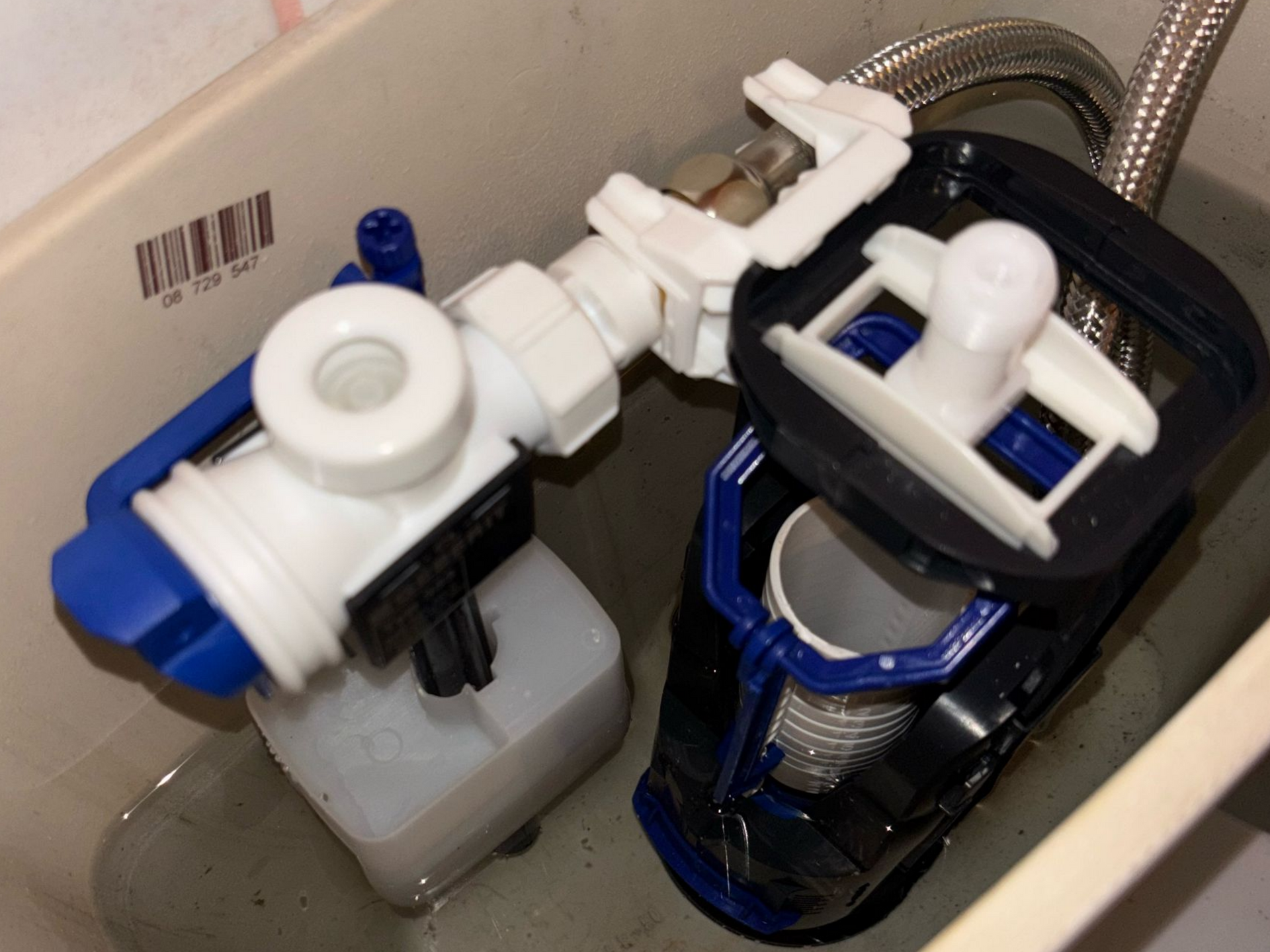 Un mécanisme de chasse d'eau de WC