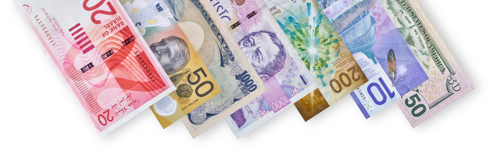 Plusieurs billets de banques de plusieurs devises.