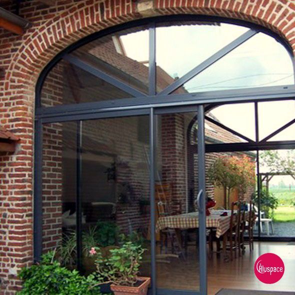 Baies vitrées pour un jardin d'hiver à Issoudun