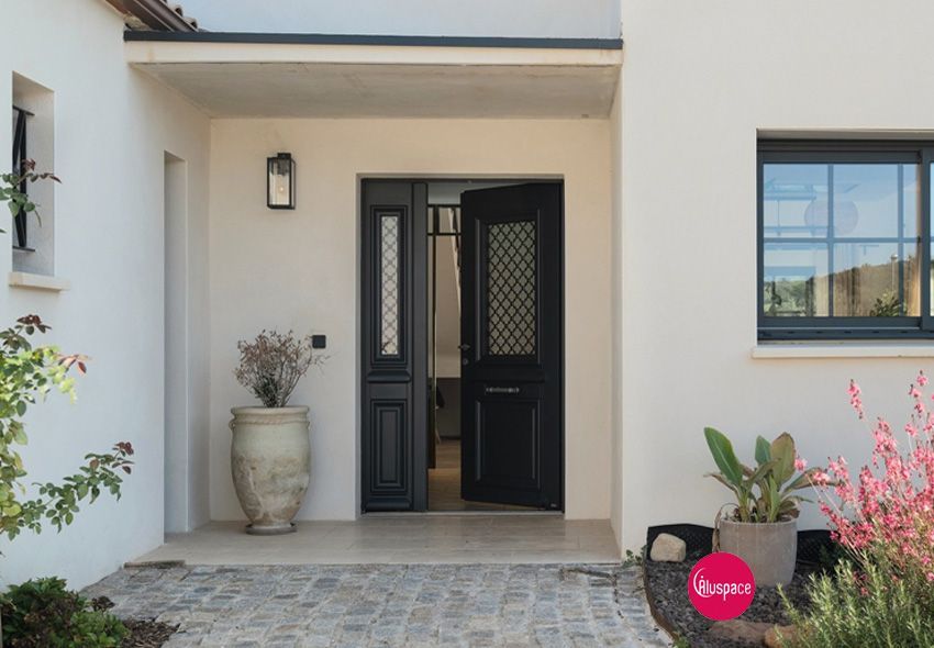 Porte d'entrée à deux vantaux