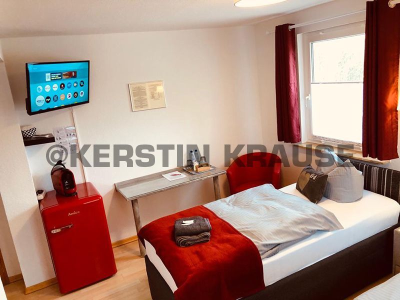 K. Krause Zimmervermietung Salzgitter Heerte - Bett