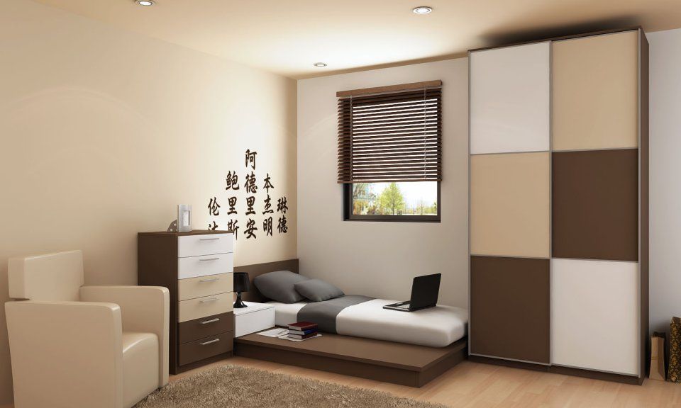 Dormitorio moderno con cama, armario, escritorio y sillón. Tonos tierra y estética minimalista.