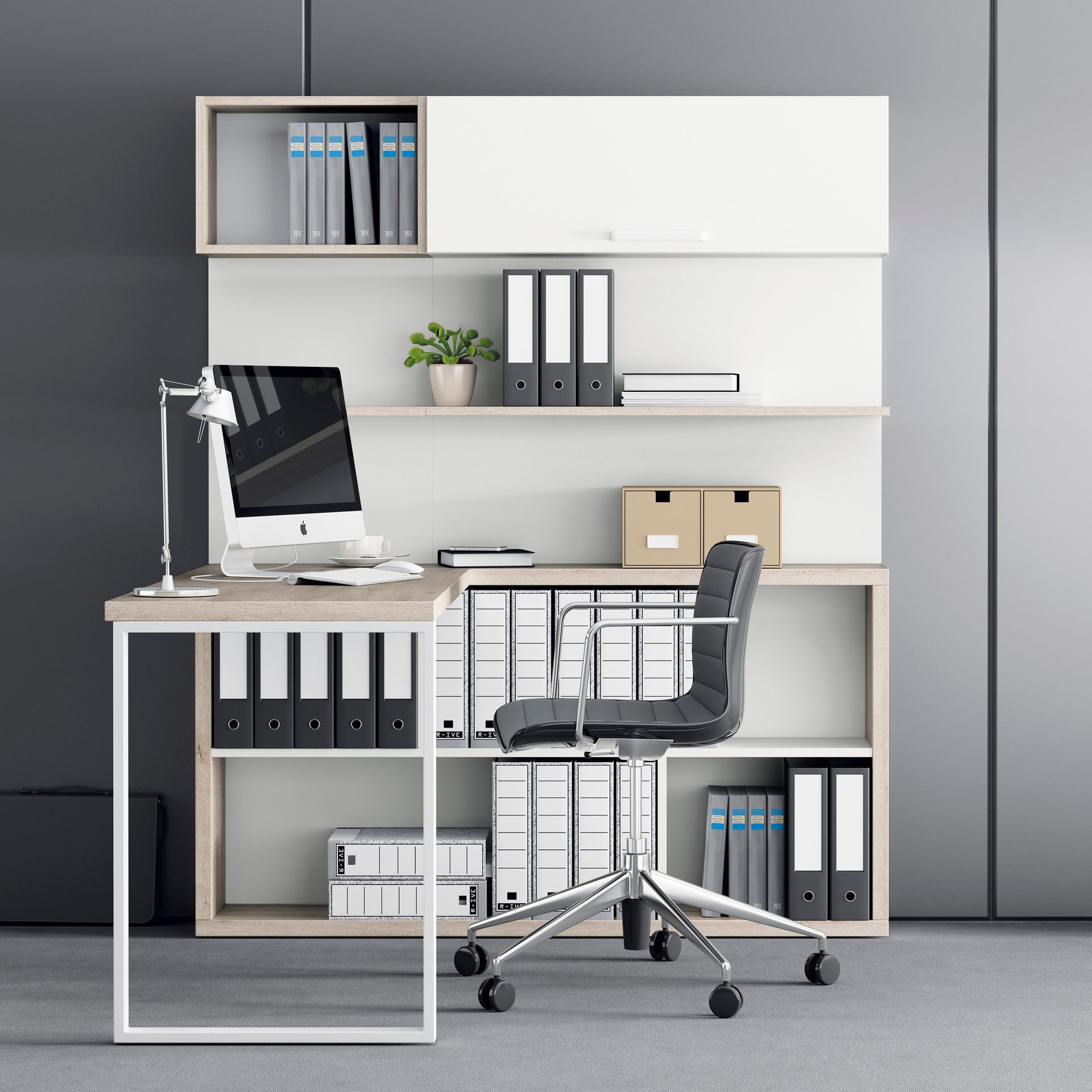 Escritorio de oficina con computadora, silla y estantería llena de carpetas y útiles.