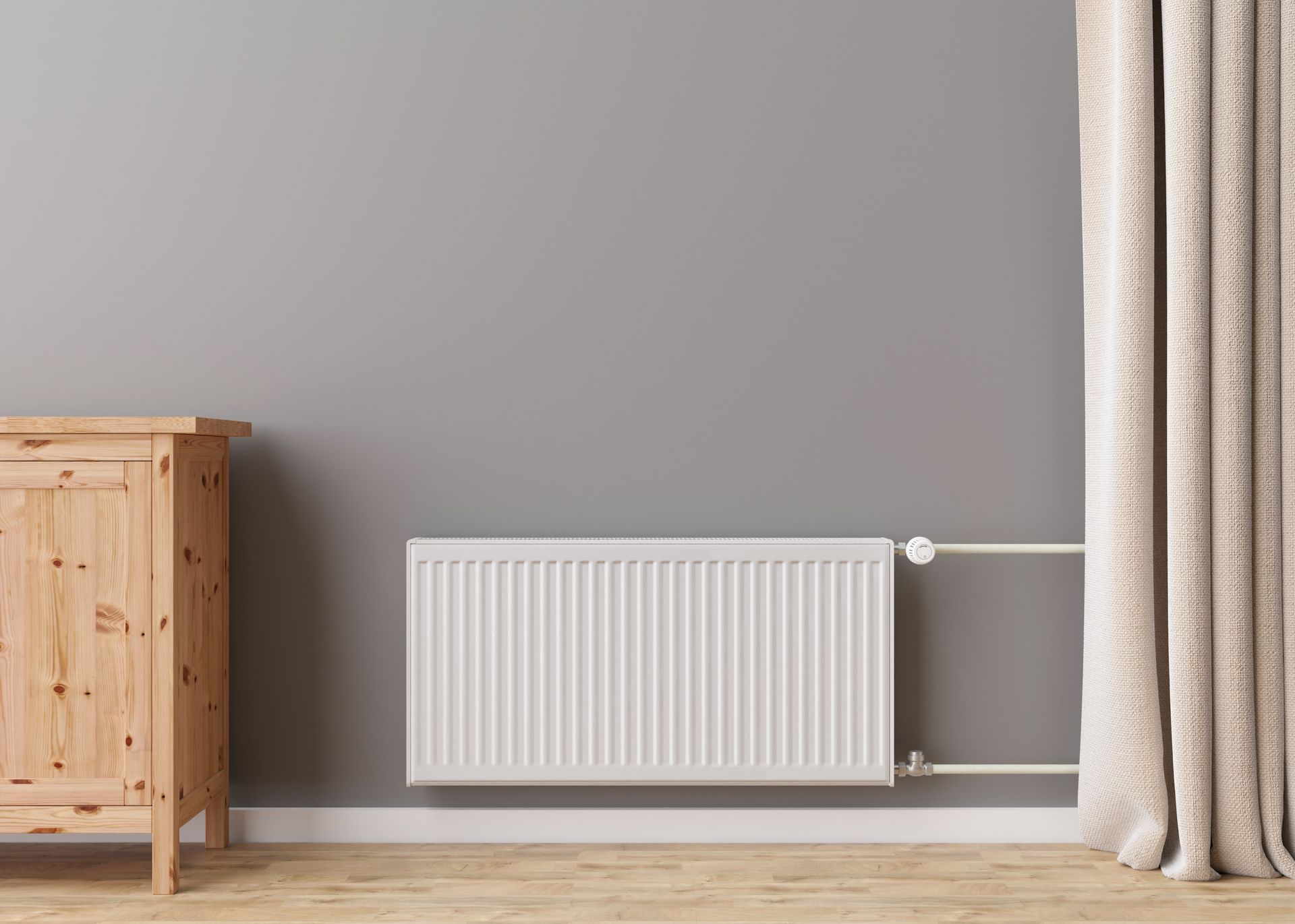 Un radiateur hydraulique dans un salon.
