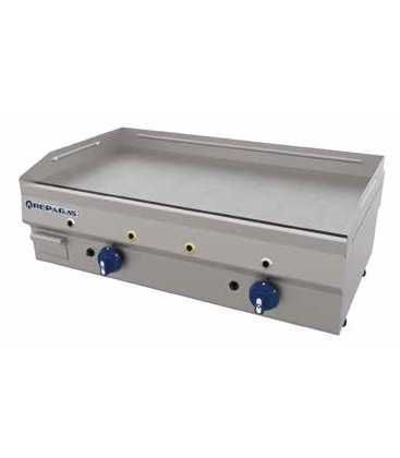 Una plancha de acero inoxidable con dos perillas azules sobre un fondo blanco.