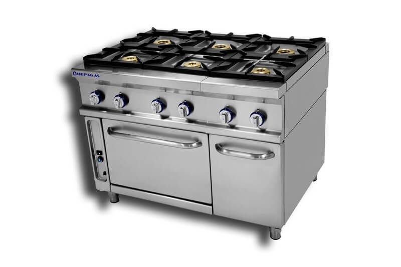 Una estufa de acero inoxidable con cuatro quemadores y un horno.