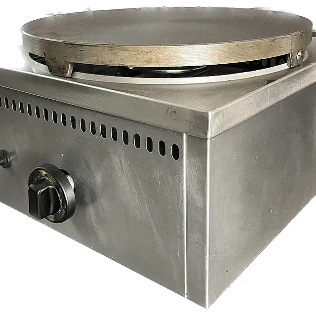 Una estufa de acero inoxidable con un quemador encima.