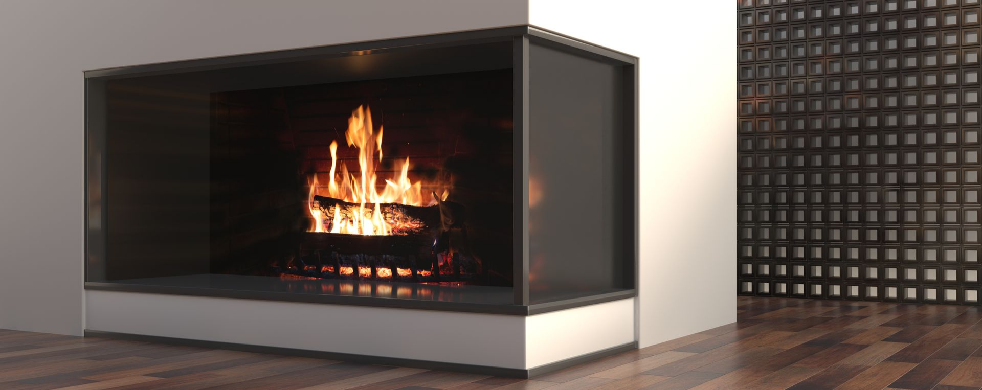 Cheminée avec feu allumé, entourage sombre, dans une pièce blanche avec parquet et mur texturé.