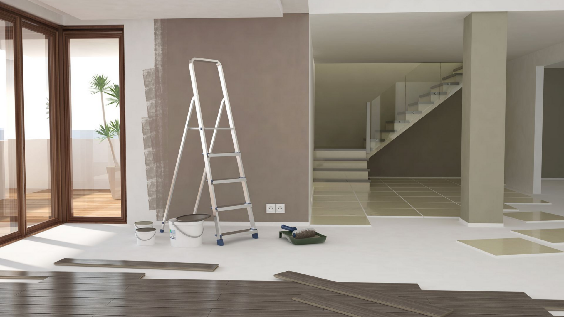 Un escabeau, des seaux de peinture et des outils sur un sol en cours de rénovation dans une pièce moderne et lumineuse avec un escalier.
