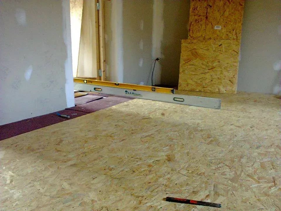 Travaux de recouvrement d'un ancien sol