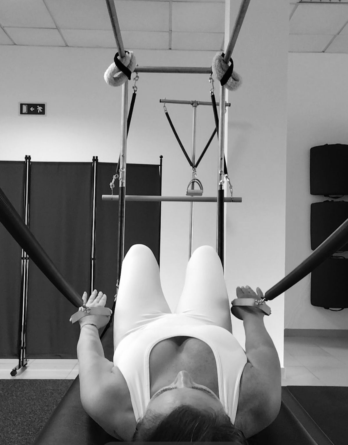 Una máquina de pilates con la letra i en ella