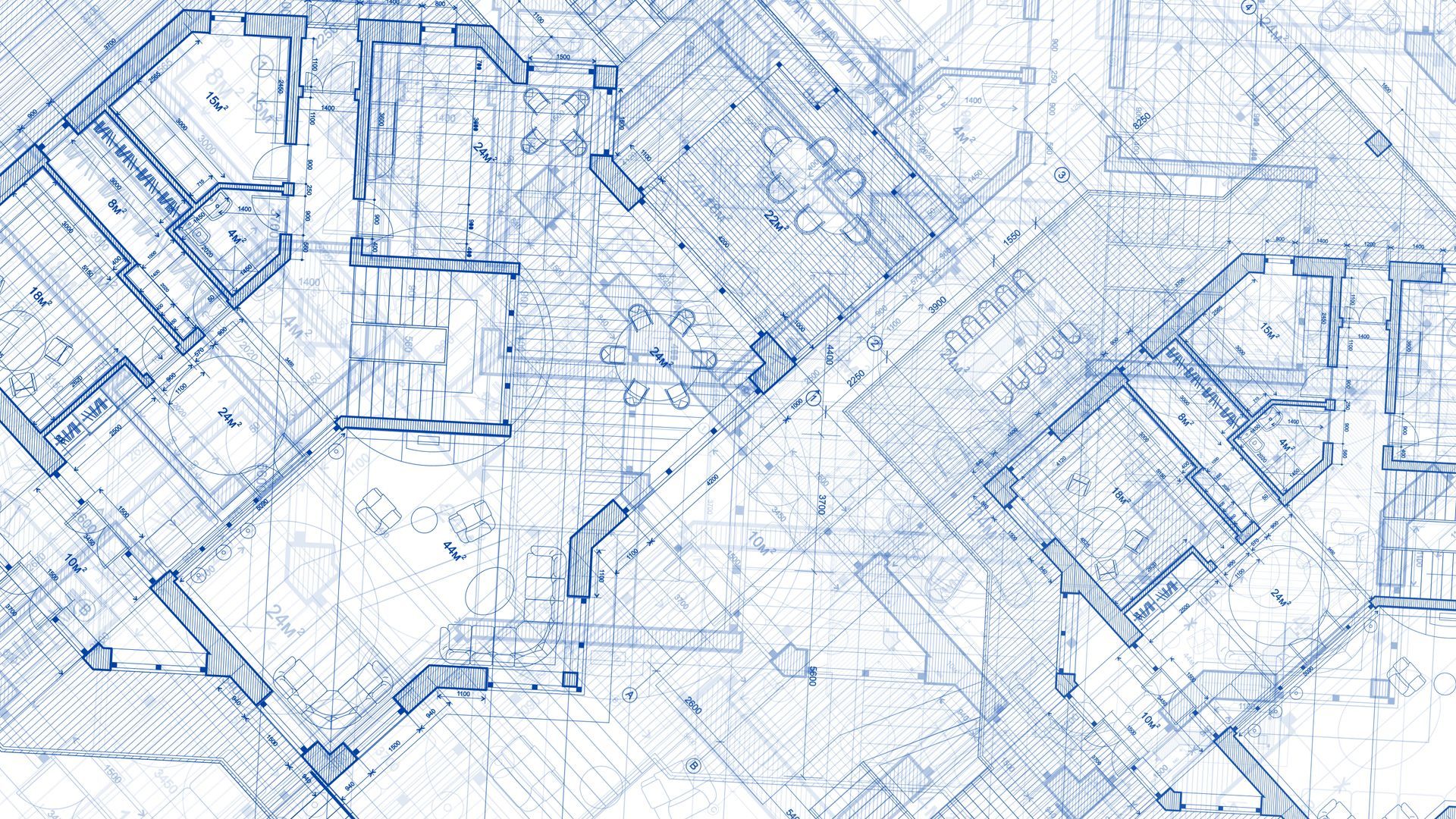 Plan technique bleu d'un bâtiment, avec lignes géométriques et agencement des pièces.