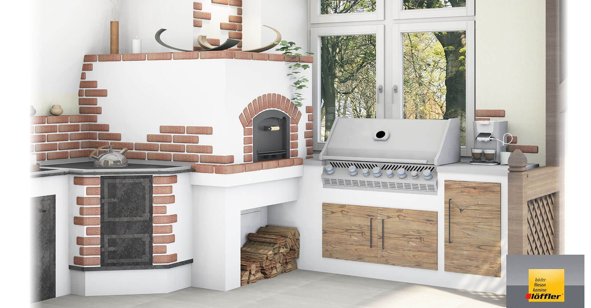 Eine Küche mit Steinofen und Grill