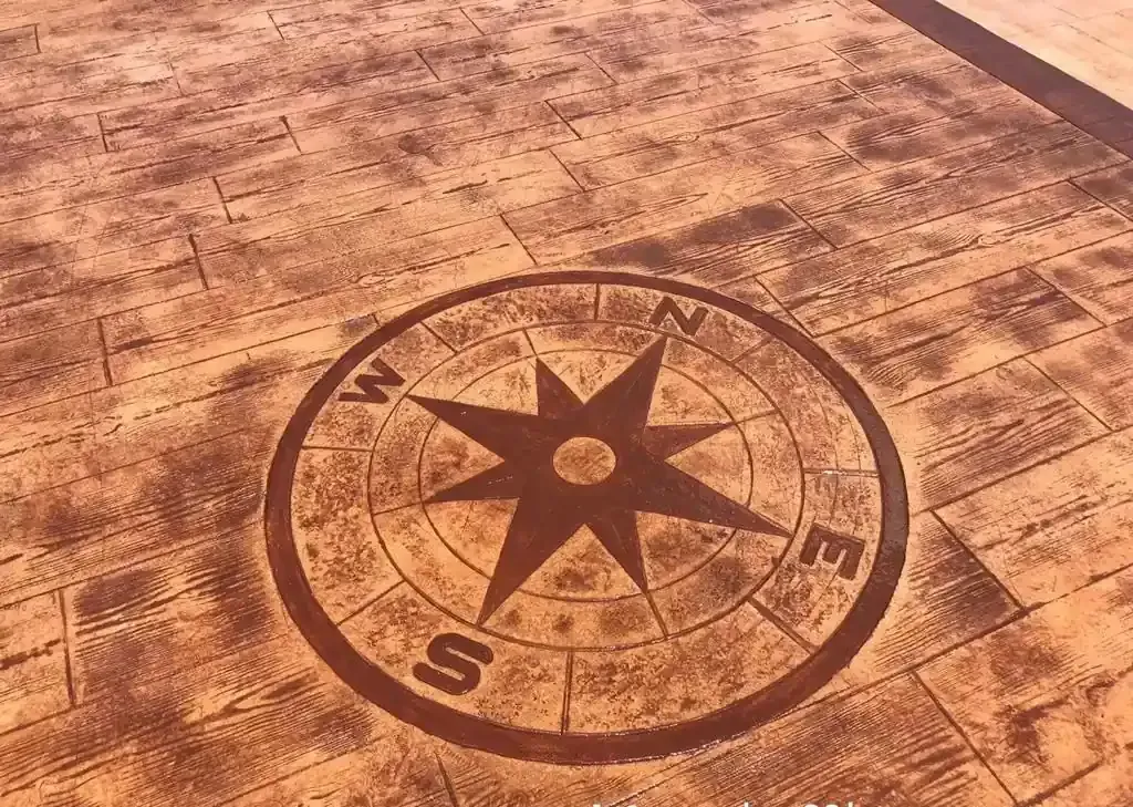 El círculo de las cosechas en un campo representa una rosa de los vientos con los puntos cardinales marcados.