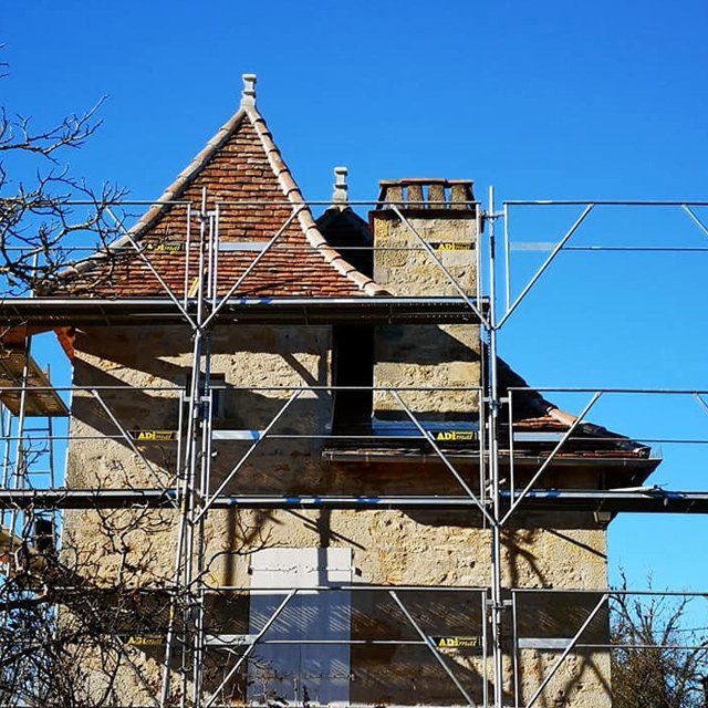 Restauration d'une bâtisse ancienne par l'entreprise