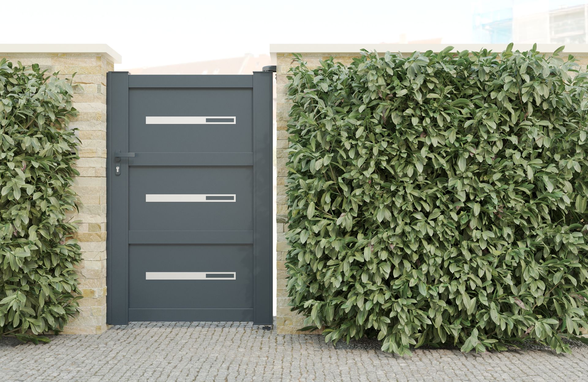 Portillon Tarn Vulcano près d'une haie