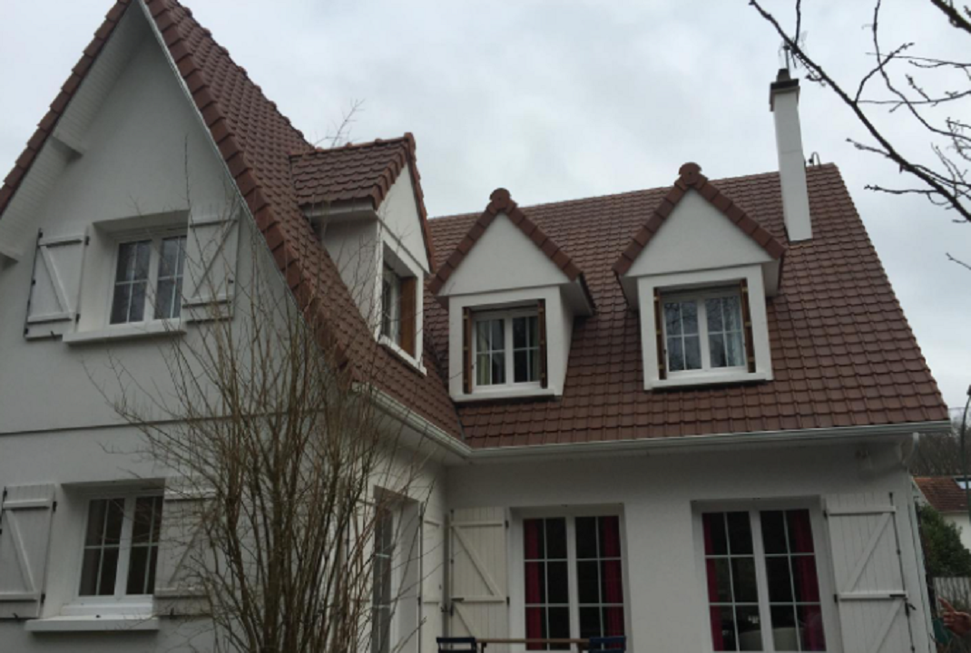 Maison avec toiture en tuiles neuves