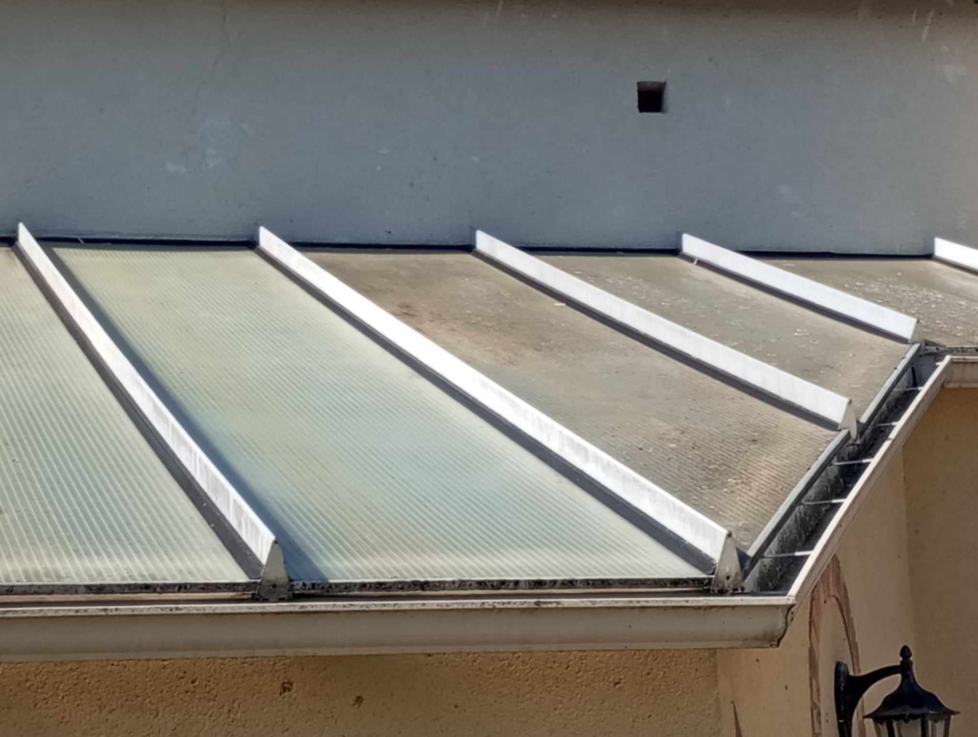 nettoyage toiture de véranda 