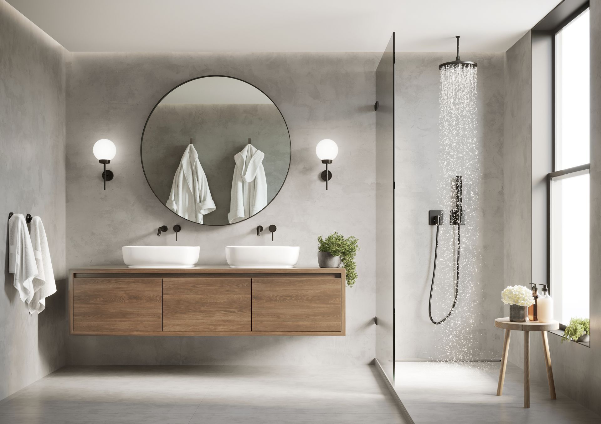 Salle de bains avec douche et grand miroir circulaire sur le mur