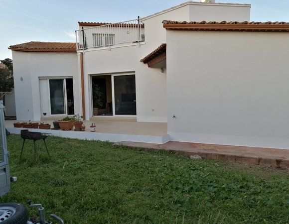 Maison avec un rooftop