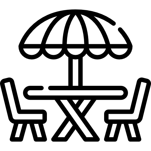 Ein Tisch und Stühle mit einem Sonnenschirm kostenlos Icon